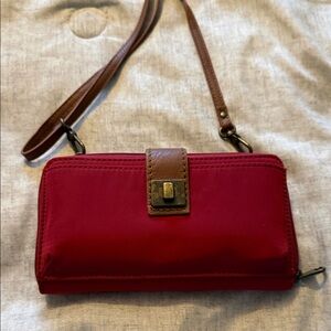The Sak Burgundy and Tan Clutch Wristlet